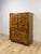 This vintage tallboy armoire by John Stuart Inc. is a genuinely collectible example of mid-century modern craftsmanship,...
