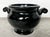 Vintage mid century McCoy black ceramic urn. Low round shape with art deco curled handles. Made in USA.
