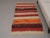 Vintage Hand-Knotted runner rug is a semi-antique vintage area rug. The '70s Eastern region of Anatolia's unique rug is...
