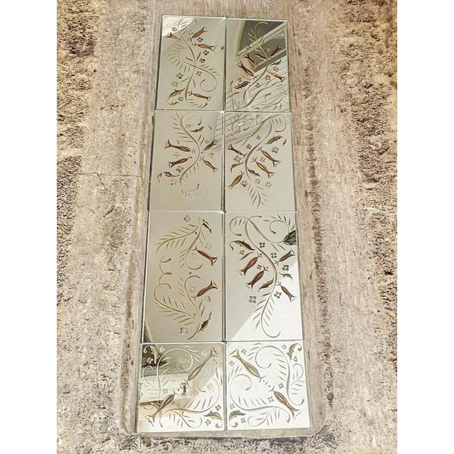 Elegant French Art Deco mirrored wall composition dating from the 1940s, consisting of eight separate rectangular mirror...