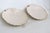 This beautiful Pair of 2 Dishes are made of ivory porcelain. These pieces are both stamped on the bottom as having been...