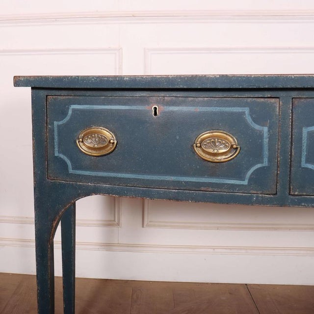 Early 19th Century English painted bowfront console table with 3 drawers This piece is designed in the style of the...
