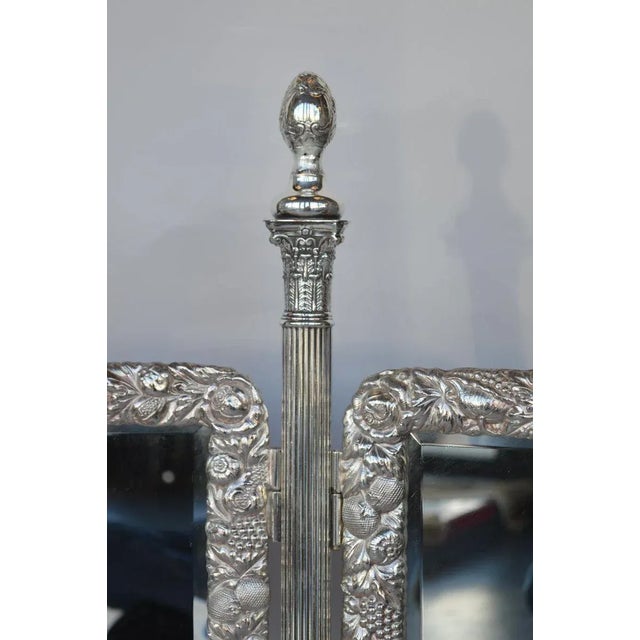 Early 1900s bronze silver plated vanity mirror.