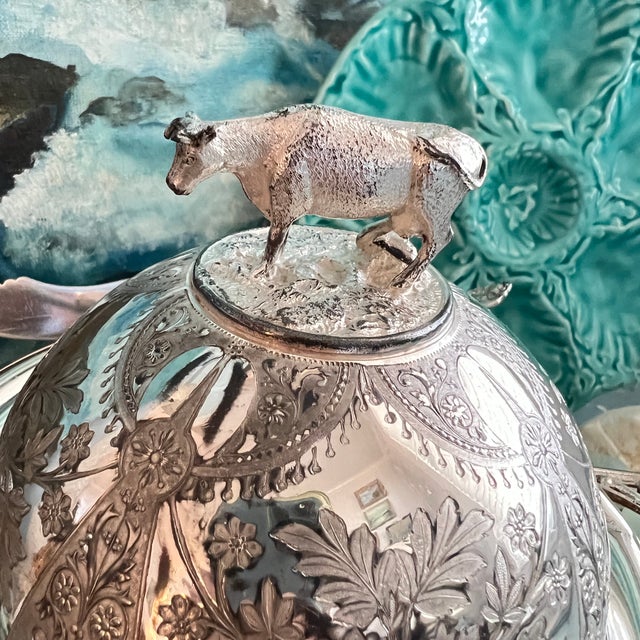 Add a touch of elegance and history to your dining table with the Antique Victorian Quadruple Silverplate Butter Cooler by...