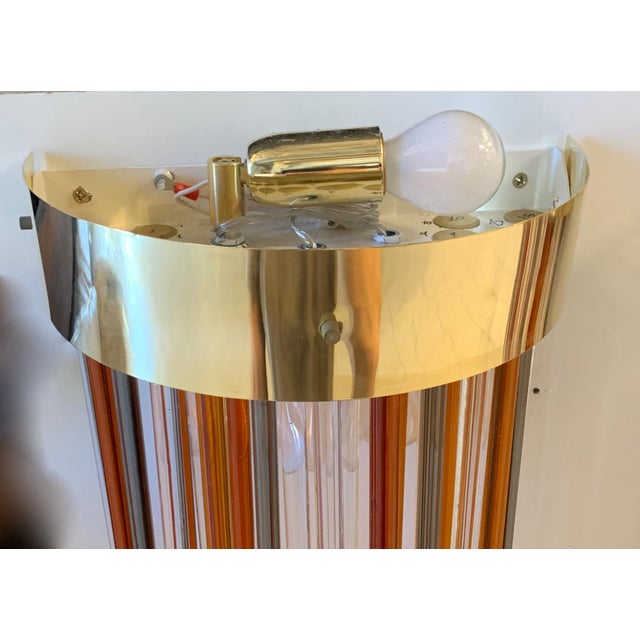 Pair of abstract artistic compositions "Altobosco" created by Enrico Neri & c.snc Lamps made with numerous colored glass...