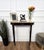 Very elegant and refined Italian 1950s Mid-Century Modern and neoclassical design console table. The four stunning carved...