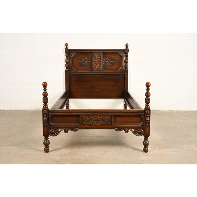 An exceptional English Jacobean or Renaissance Revival style twin size bed In the manner of Berkey & Gay USA, Circa 1920s...