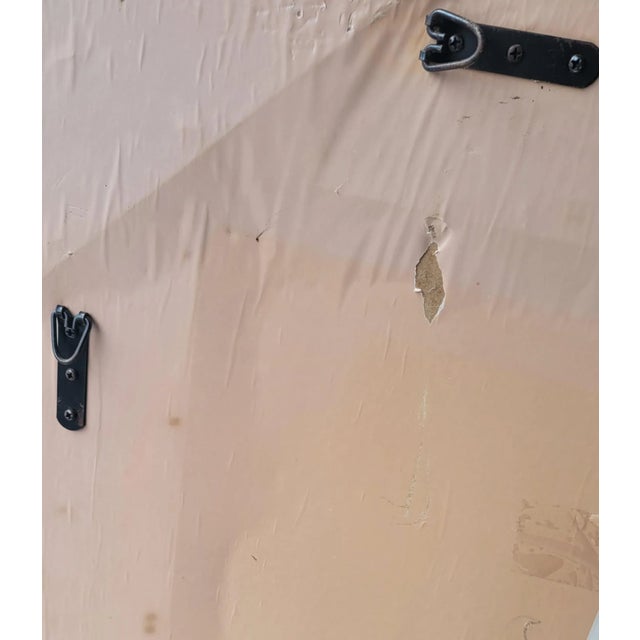 A beautiful wall mirror with a very unique antique gold frame. The back has hangers and can be hung vertically or...