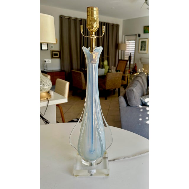A mid century large scale single Murano blue opalescent colored glass table lamp shaped with protruding fins. Mounted on a...