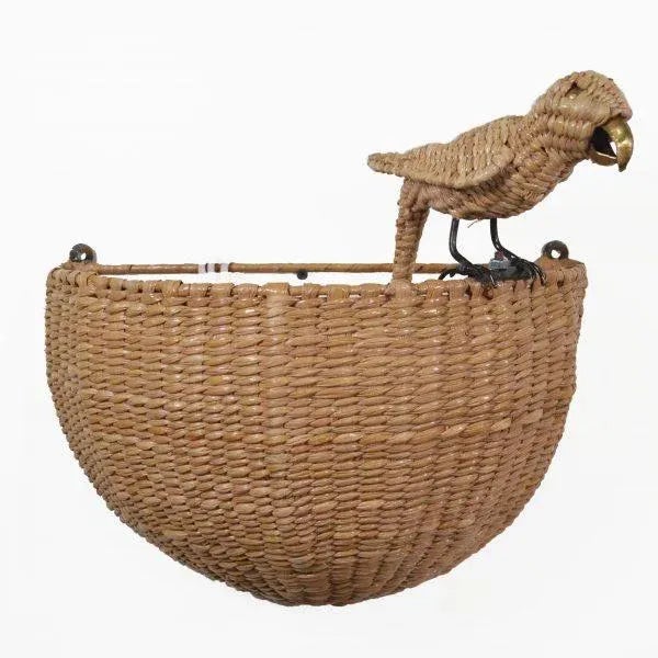 Pair of Parakeet Sconces by Mario Lopez Torres. There are minor imperfections to the hand-made woven rattan. Original...