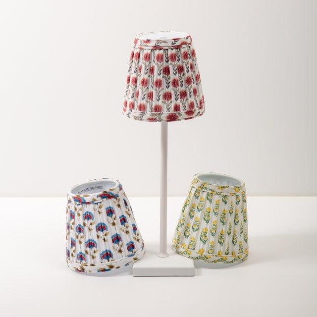 Introducing our collection of rechargeable, cordless lamp shades. &nbsp;This printed floral cotton shade with signature...