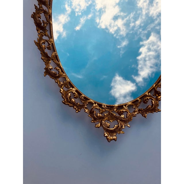 This pierced brass tray has been gold plated. The foliate design is in the French taste. The mirror is in absolute perfect...