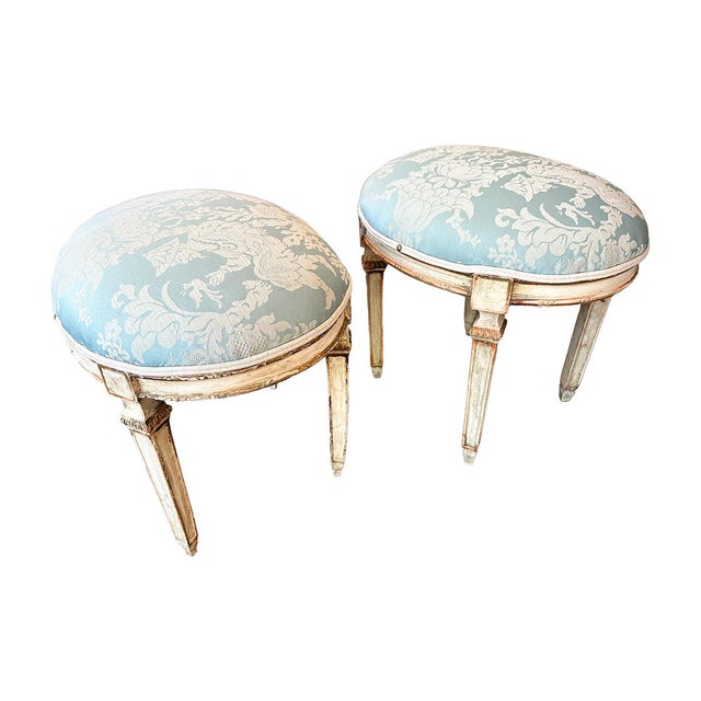 This late 19th-century stool is in sturdy, usable condition. It is upholstered in a light blue patterned fabric and has a...