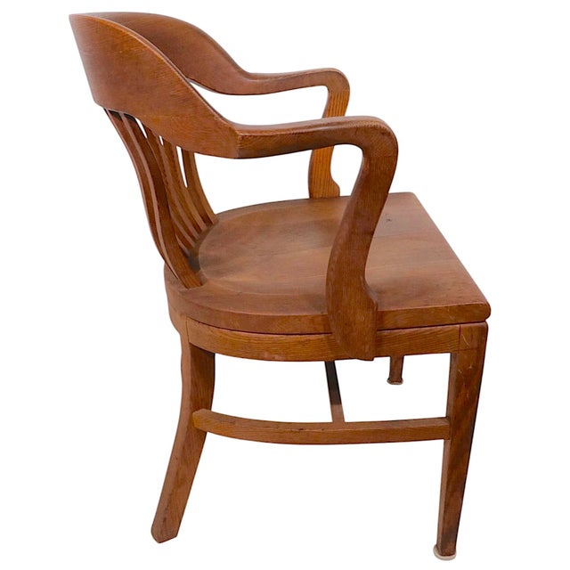Classic Bank of England, Yale Library, Jury chair, constructed of solid oak, by Gunlocke, circa 1940's. Very nice, clean,...