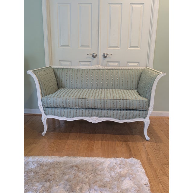 Exquisite French Style Settee featuring Ornately Carved & hand painted Frame with Cabriole in legs, straight back and...