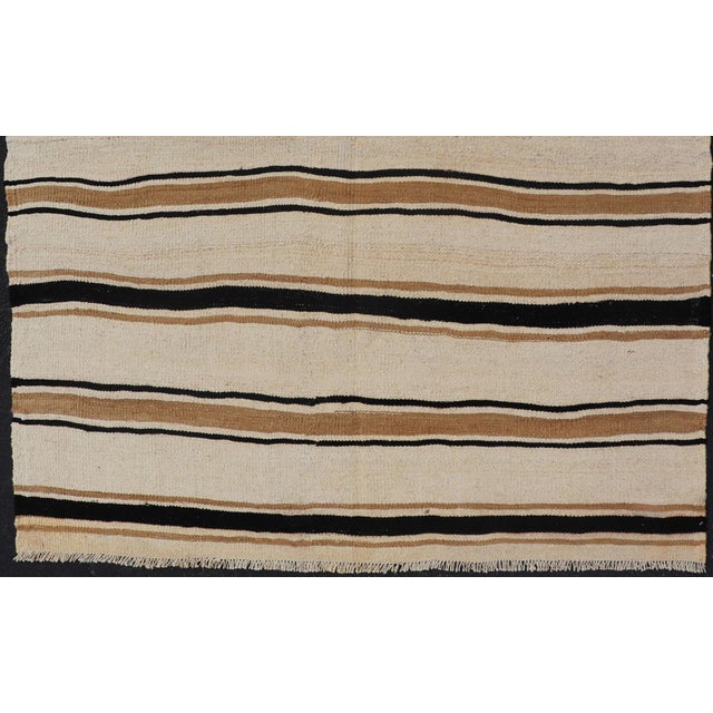 Measures: 4'10 x 6'1 Vintage Turkish Kilim Rug with Ivory, Brown and Deep Charcoal Stripes. Keivan Woven Arts / rug/TU-...