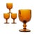 Amber glass goblets, group of 4. This a gorgeous set of Carlo Moretti-style chunky translucent amber wine goblets with a...