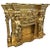 Grand French-Style Fireplace Mantel – Ornate Gold Leaf Finish With Sculpted Bronze Details For Sale