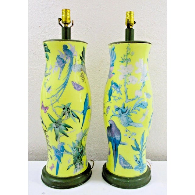 This pair of English Mid-Century Palm Beach Reverse Decoupage Botanical Table Lamps exudes a vintage charm from the 1970s...