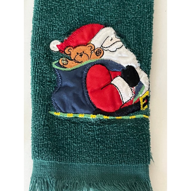 Vintage 20 th c never used Christmas Holidays guest face\ hand Terry towels with Santa’s and Snowman appliqués.