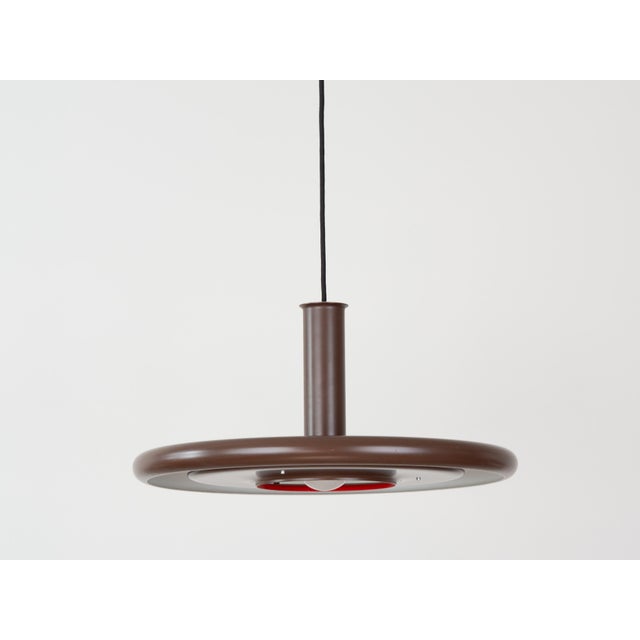 The Optima lamp was designed in 1973 by Hans Due and manufactured by the Danish company Fog og Morup. The Optima series is...