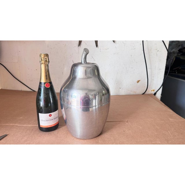 1970s French Pear-Shaped Ice Bucket, Silver Finish with Mirrored Effect, Sculptural Design : This striking pear-shaped ice...