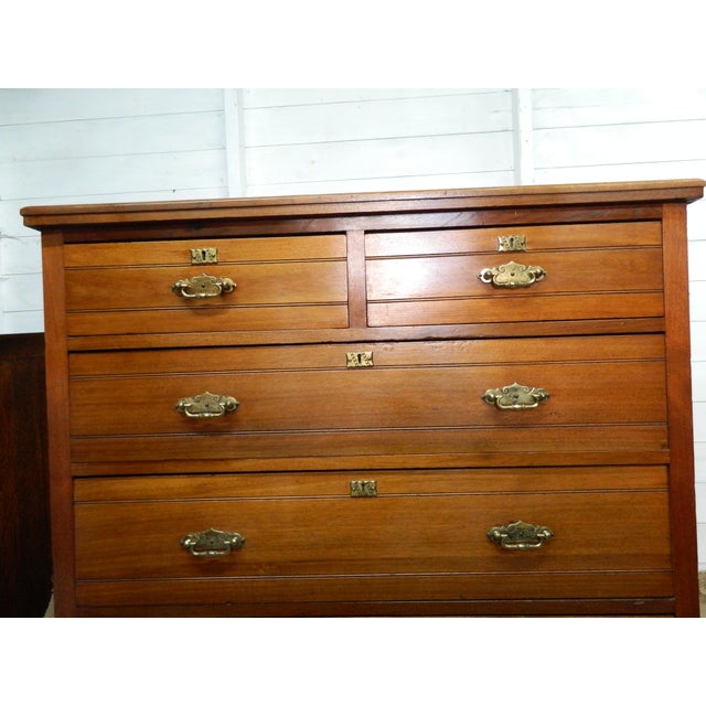 The Blyth and Sons Victorian Walnut Chest of Drawers is a fine example of antique furniture from the Victorian era....