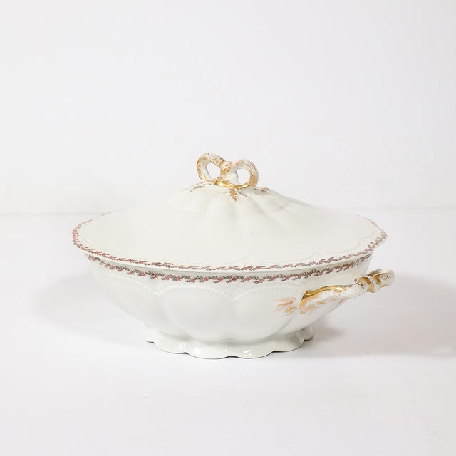 This signed Haviland for Limoges porcelain dinner service, crafted in France circa 1900, showcases the exquisite Daisy...