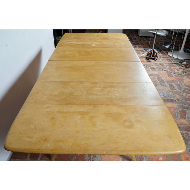 Heywood Wakefield butterfly drop leaf wishbone dining table with 2 leaves. Item features (2) 18" leaves, drop leaf sides,...