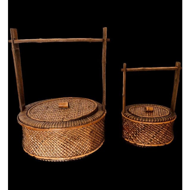 Antique Chinese baskets made of woven rattan, bamboo. Hand made involving intricate weaving skills. A beautiful set for...