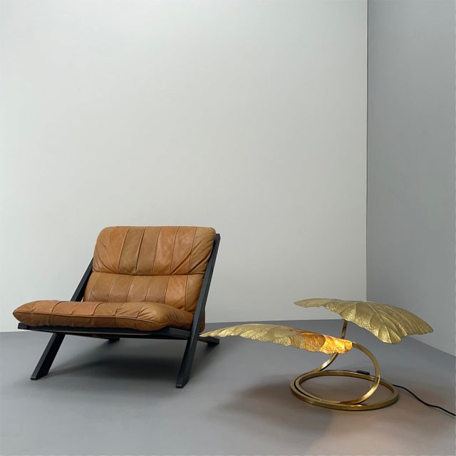 Design: Carlo Giorgi for Bottega Gadda, Italy, 1970s Two embossed brass shades in the shape of rhubarb leaves on curved...