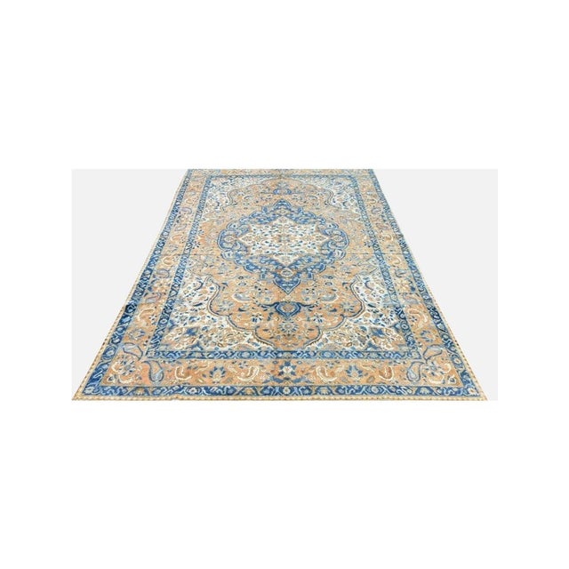 Discover the appeal of the unique 7x10 Antique Persian Bakhtiari Rug, which adds classic style to your house. This...