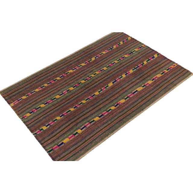 Originating from Turkey circa 1950-1960, a rare type of chaput kilim rug style now entering our Antique & Vintage...