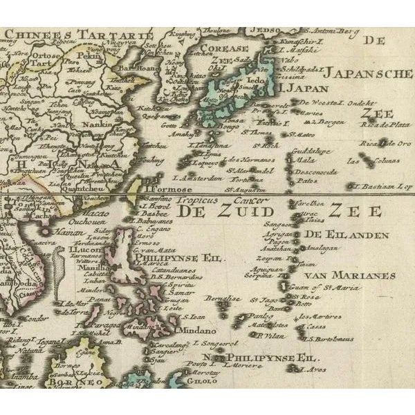 Title: "Kaartje van Oost-Indien na de stelling van den Heer Guillaume de L'Isle" Translates to "Map of the East-Indies...