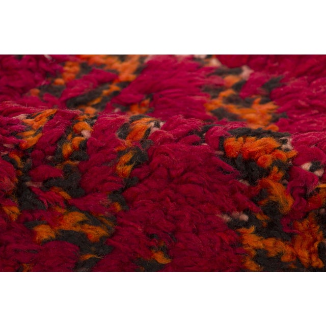 Hand-knotted in wool and originating circa 1950-1959, this 6x10 vintage shag rug is an exciting addition to Rug & Kilim’s...