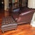 Vintage Ethan Allen English Chesterfield Leather ottoman, featuring: Material: Brown leather with diamond tufting. Base: A...