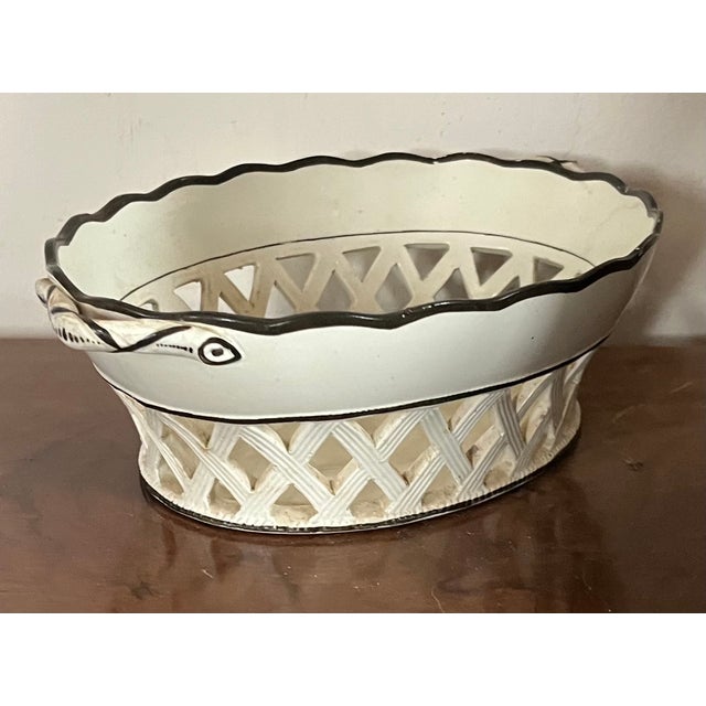 Antique early 19th century English Georgian creamware chestnut basket with open sides and ruffled rim picked out in brown...