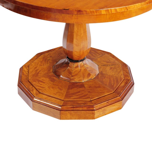 Salon table Germany around 1860 Birch, Biedermeier style, round top, octagonal base, star inlay in the middle of the top...