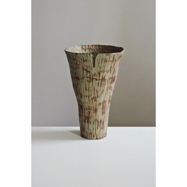 In Bloom III Ceramic Vase by Antonia Maria One of a Kind. Dimensions: Ø 24 x H 38 cm. Materials: Ceramic, grey clay,...