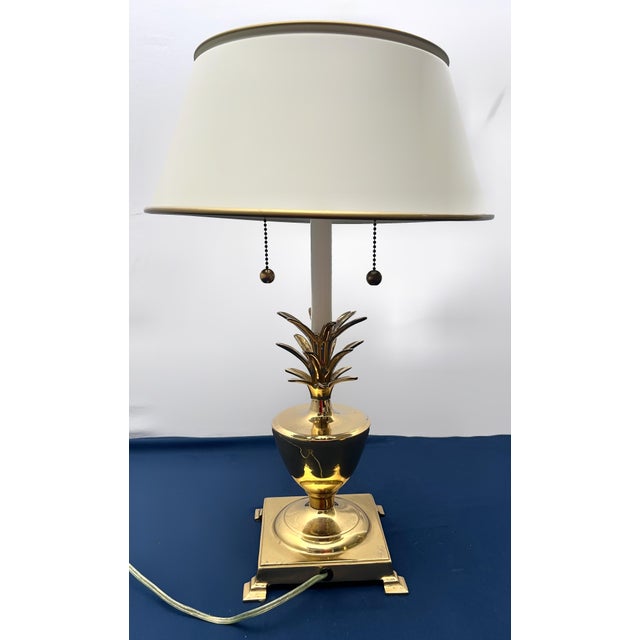 This commanding mid-century Hollywood Regency table lamp, designed in the distinguished manner of Frederick Cooper and...