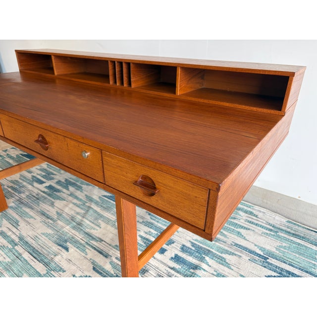 A stunning piece of history. Pictures don't even do it justice. Authentic Mid-Century Danish Modern teak desk designed by...