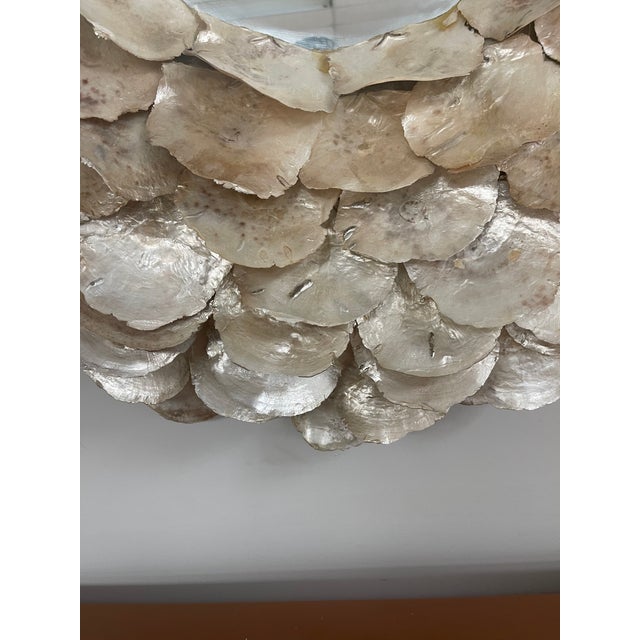 Large impressive Made Goods floor sample round mirror made of multi rows of 4” large Capiz shells.