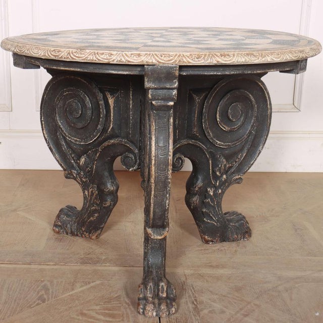 Really quirky German 19th C painted lamp table with a carved base. 1890 Dimensions:H: 62cm (24.4")Di: 80cm (31.5") This...