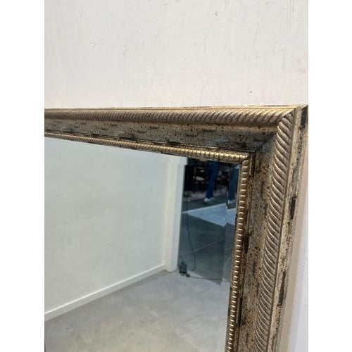 Beautiful large vintage mirror featuring an elegant giltwood frame with a richly aged patina. The frame shows a stunning...