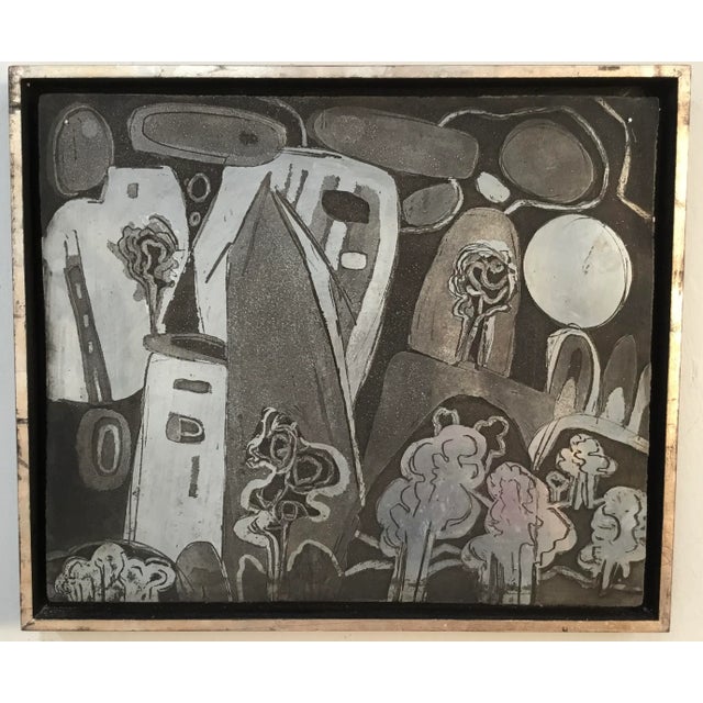 Acid etched metal printing plate custom mount in silver leaf floating wooden frame. Very edgy and modern looking wall art...