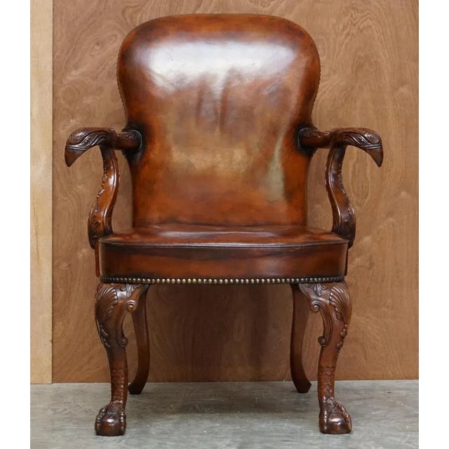 Lovely hand carved georgian style eagle head and claw & ball feet armchair a very good looking and well made piece. Based...