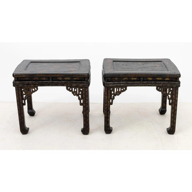 Pair of Chinese Black Lacquered End Tables, the rectangular tops with painted floral design. 19.5" H x 22.5" W x 18.5" D....