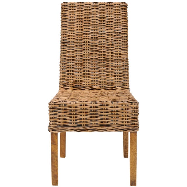 The transitional rattan Side Chair brings a soft touch to contemporary interiors in need of warmth. Crafted with mango...