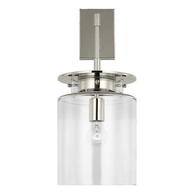Elias 23" Sconce in Polished Nickel with Clear Glass Designer: Ray Booth Finish: Polished Nickel Height: 22.5" Width: 9"...