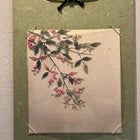 This exquisite vintage Japanese silk ribbon embroidery features a vibrant, three-dimensional floral arrangement in the...